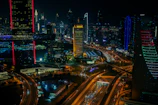 An international skyline with glowing trade routes connecting major cities.