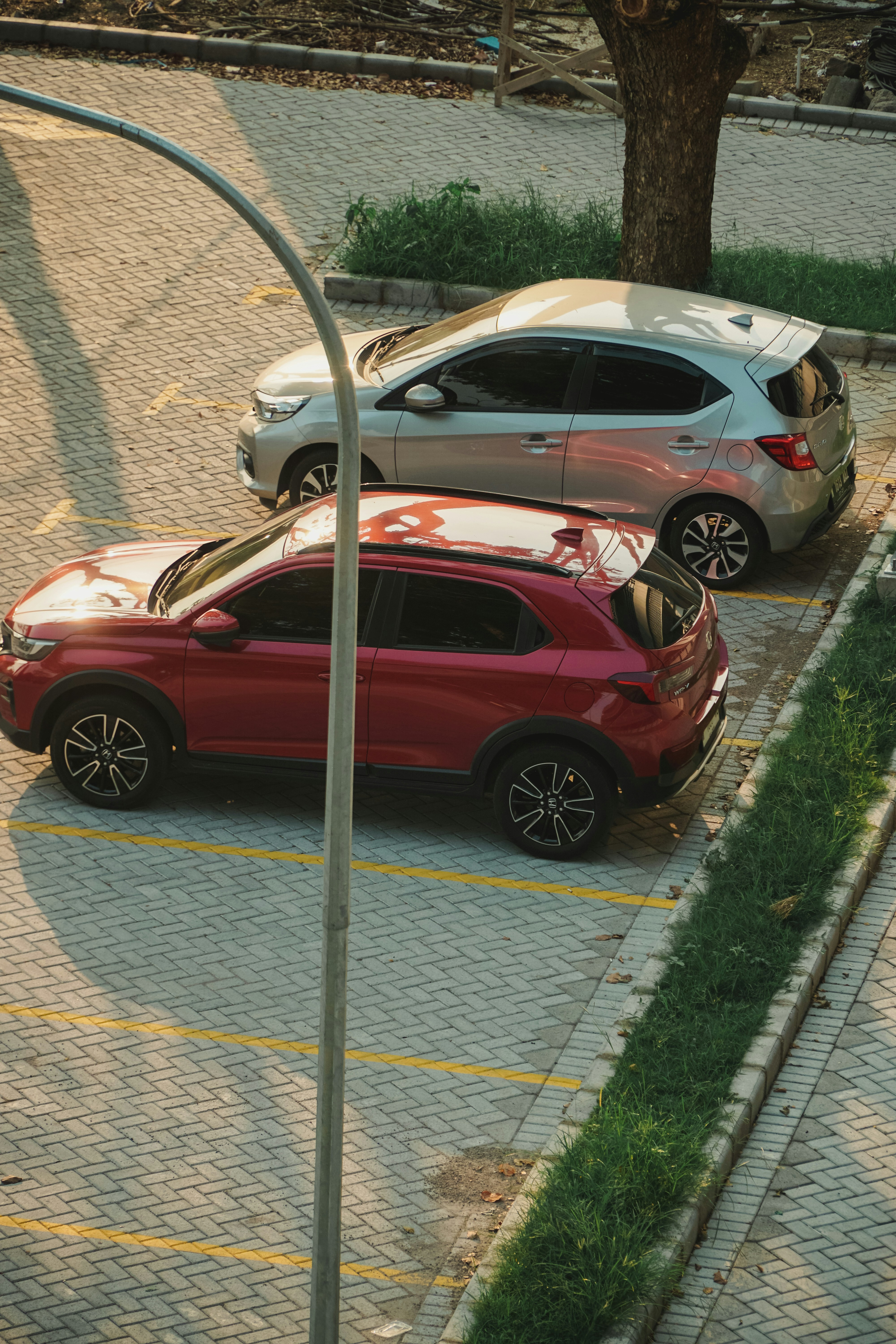 woman wearing yellow long-sleeved dress under white clouds and blue sky during daytime