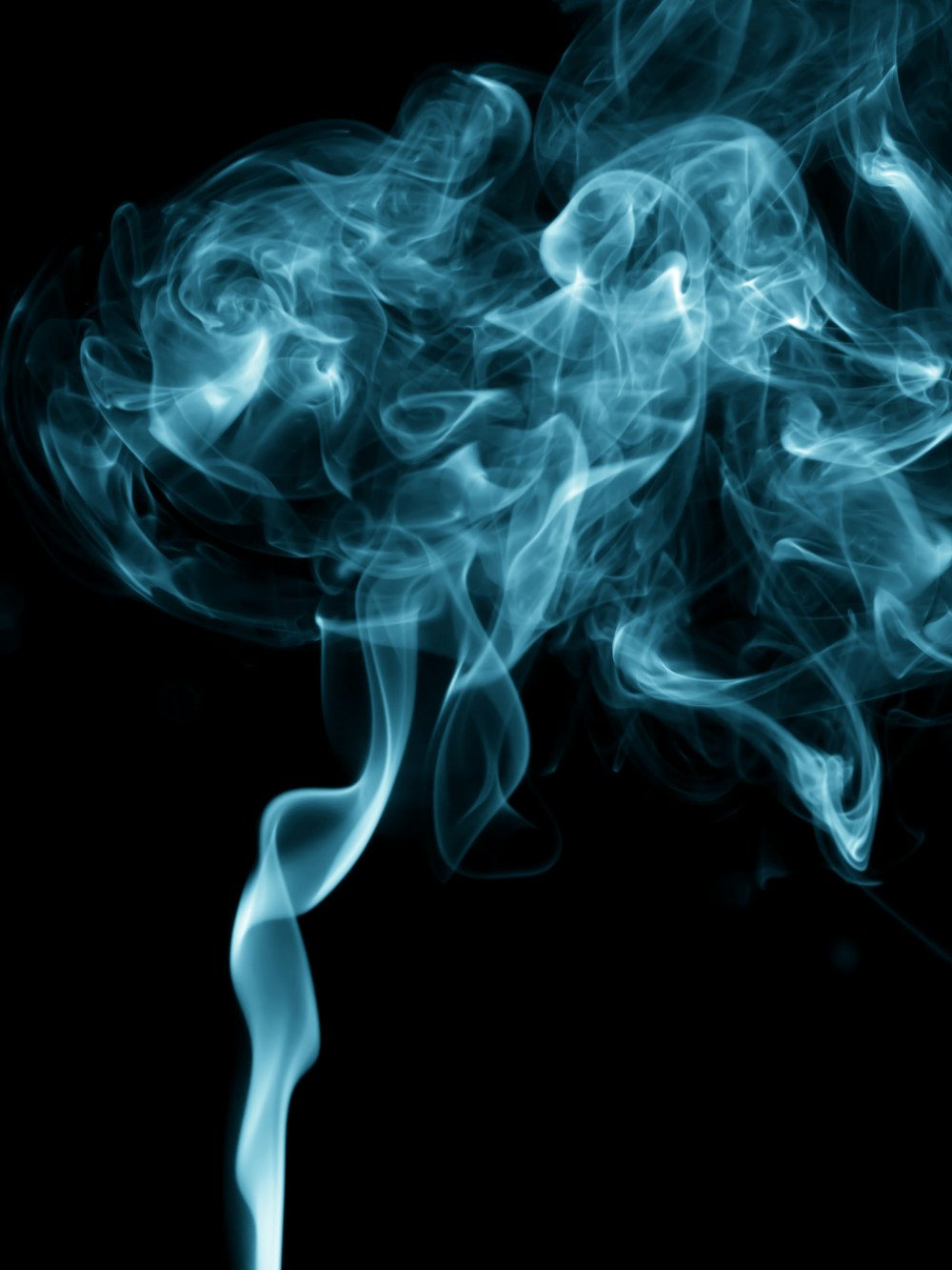 blue smoke on a black background