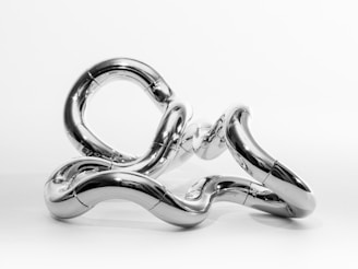 a metal sculpture of a pair of scissors