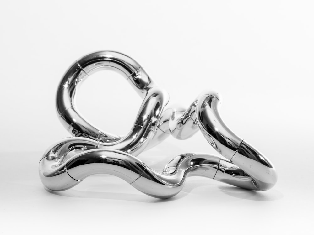 a metal sculpture of a pair of scissors