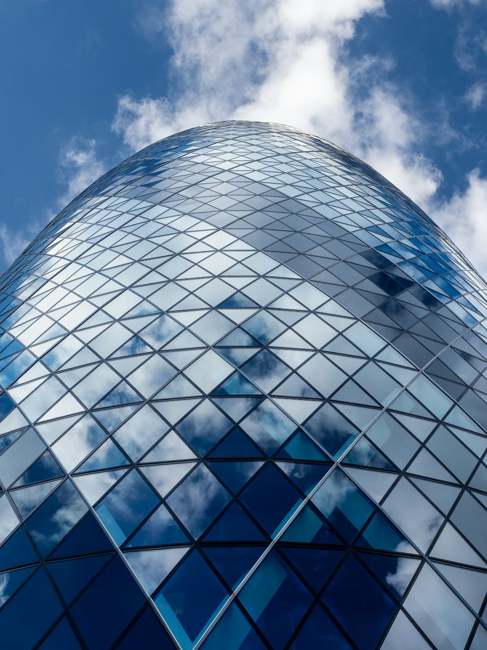 a very tall building with a sky background