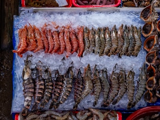 different types of seafood on ice
