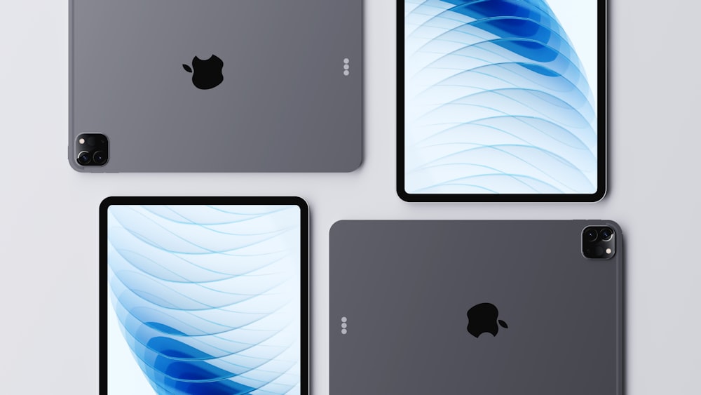 three new ipads are shown in three different angles