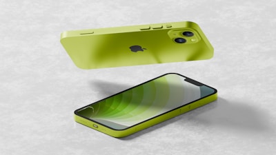 A lime green smartphone is split into two parts, with the back and front panels separated. The back panel features a dual camera system, while the front shows a screen displaying a green abstract pattern. The phone is set against a simple gray background, emphasizing its sleek design.