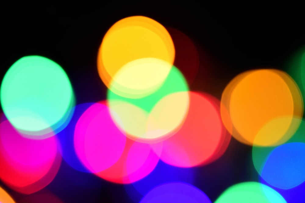 a blurry photo of colorful lights in the dark