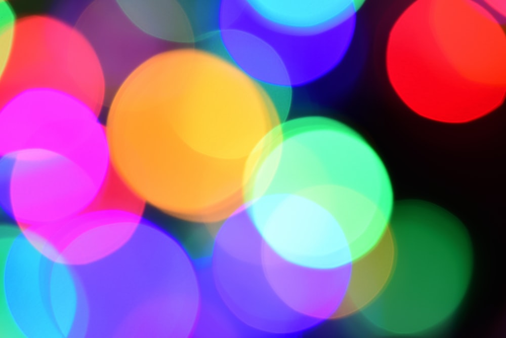 a blurry photo of colorful lights in the dark