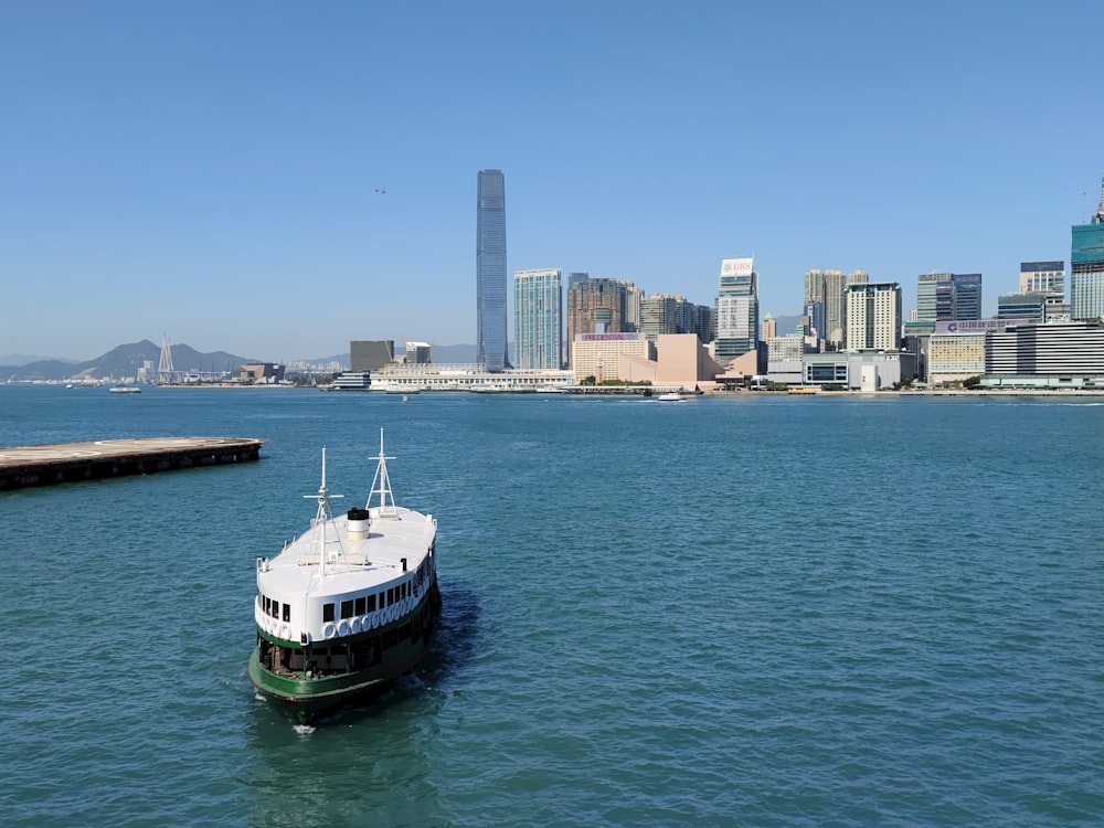 a large boat floating in the middle of a large body of water