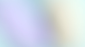 Close-up of a smooth gradient surface blending soft pastel colors in a minimalist style.