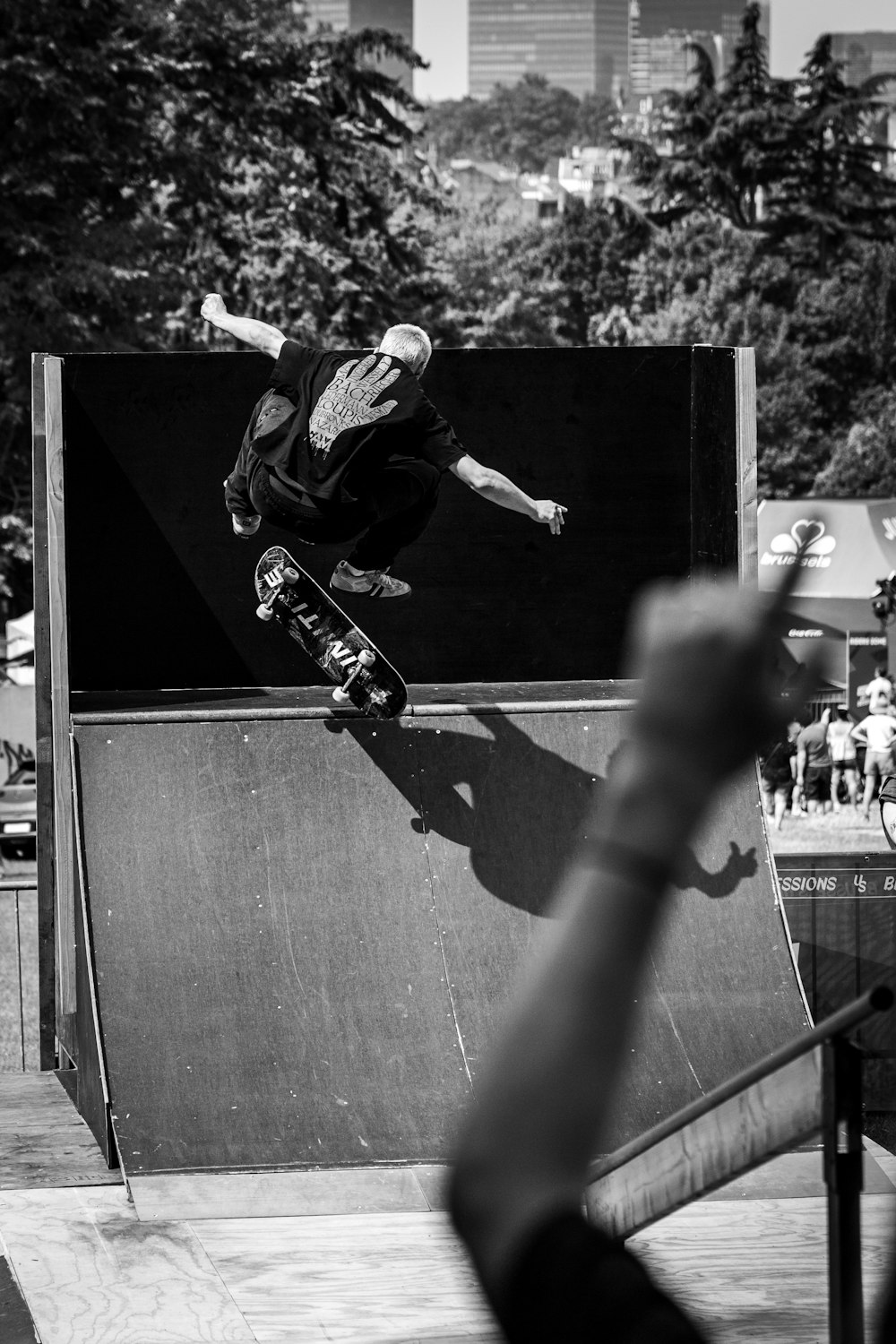 a man riding a skateboard up the side of a ramp