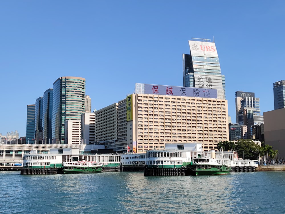 a body of water with a bunch of buildings in the background