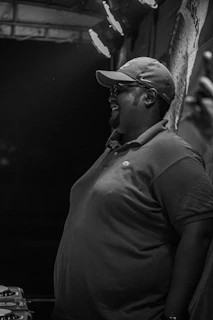 A candid shot of Pulsewave DJ laughing and connecting with guests at an intimate event.