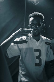 Close-up of a signed NFL jersey displayed under soft lighting.