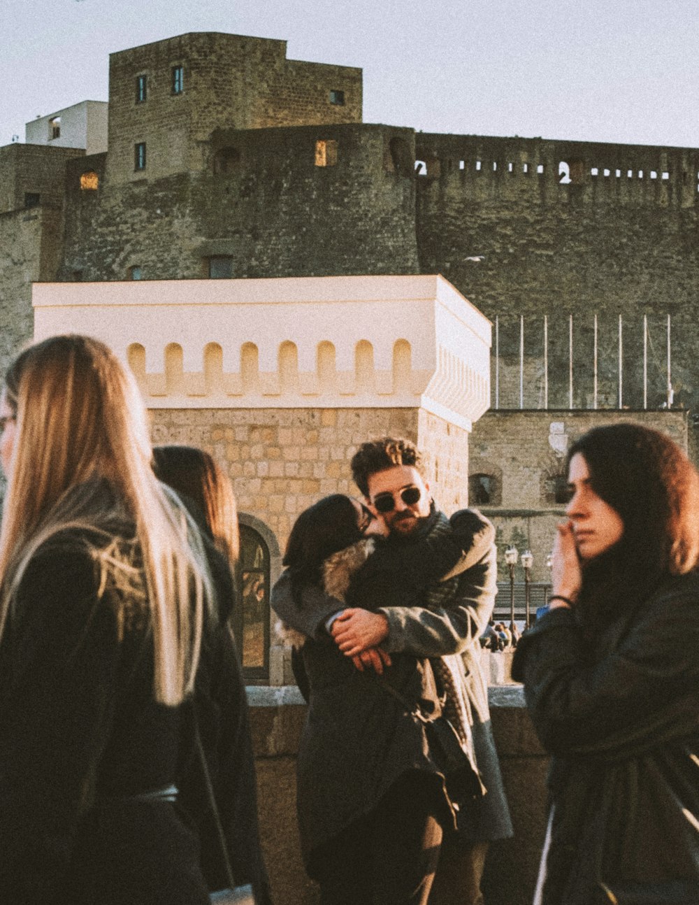 a group of people standing next to each other