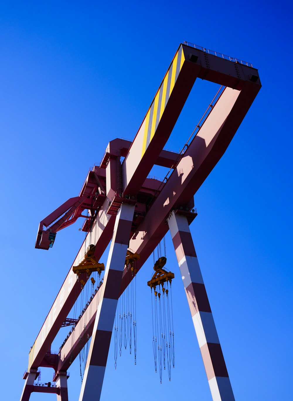 a roller coaster with a blue sky in the background