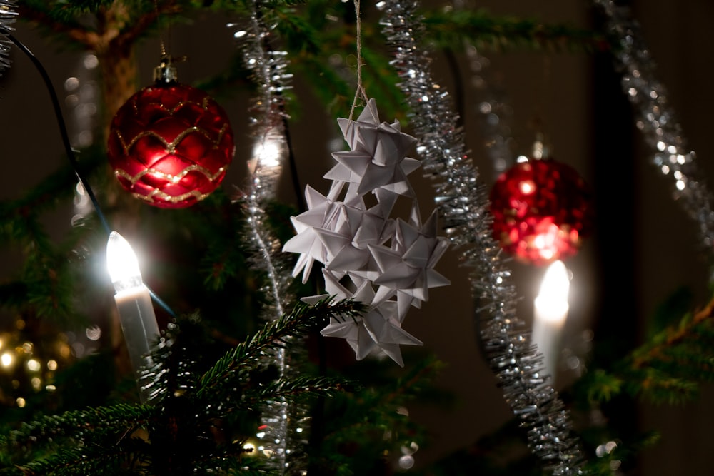 a close up of a christmas tree with ornaments