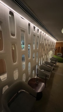 A cozy, modern wellness lounge with soft lighting and comfortable seating.