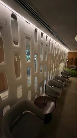 Cozy lounge area where students relax and discuss ideas between sessions.