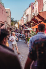 Scenic view of a neighborhood street bustling with local shops and vibrant culture.