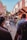 A vibrant market street bustling with tourists and colorful local shops.