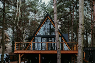 A cozy modular park home nestled among tall trees in the Eastern Cape.