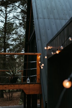 a couple of lights that are on the side of a building