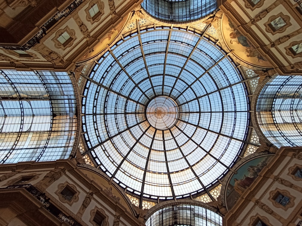 the ceiling of a building with a glass dome
