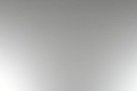 Close-up of a textured drywall ceiling with clean, precise edges.