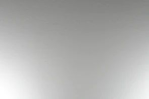 Close-up of smooth white gypsum ceiling with clean edges and perfect finishing.