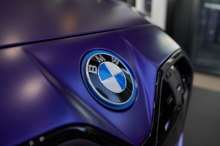 a close up of a bmw logo on a car