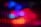 Vertical lines with a blend of vibrant colors including red, blue, and purple, creating an abstract and dynamic visual effect.