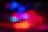 Vertical lines with a blend of vibrant colors including red, blue, and purple, creating an abstract and dynamic visual effect.