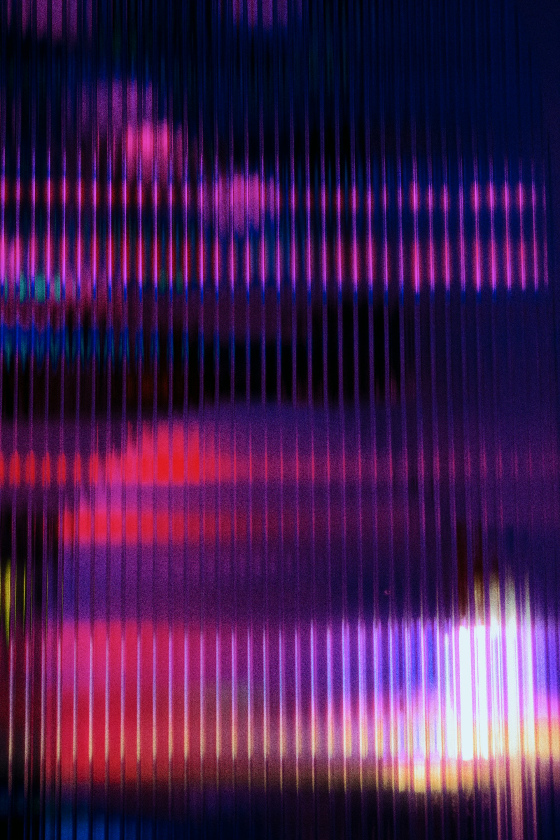 a blurry image of a building with a clock tower in the background