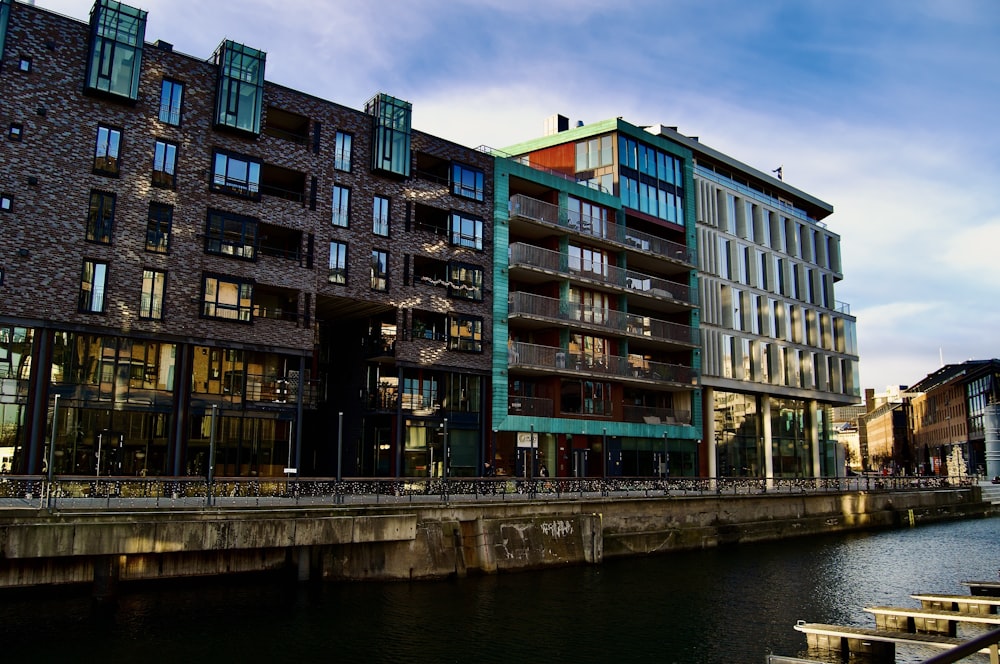 a large building next to a body of water