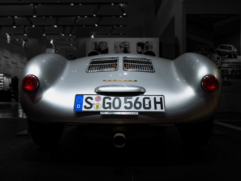 a close up of a sports car on display