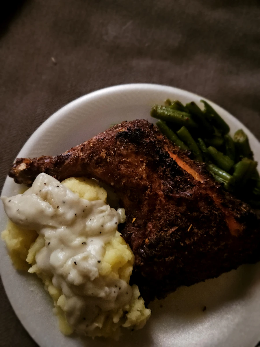 Roast meat with gravy and mashed potatoes