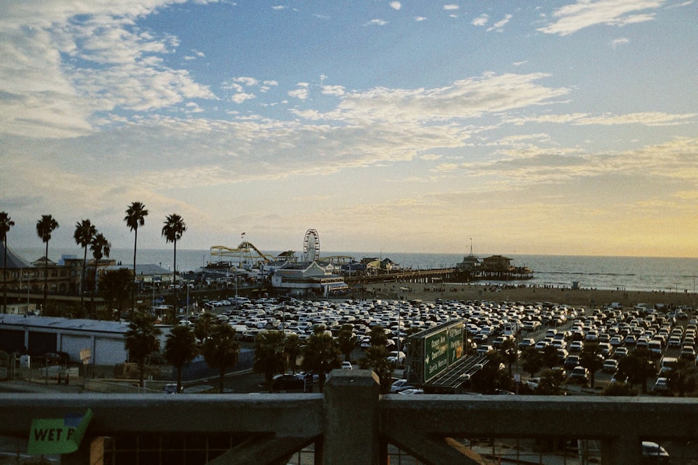 a parking lot filled with lots of parked cars