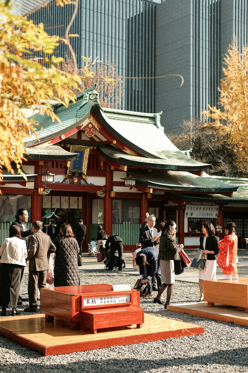 a group of people standing in front of a building