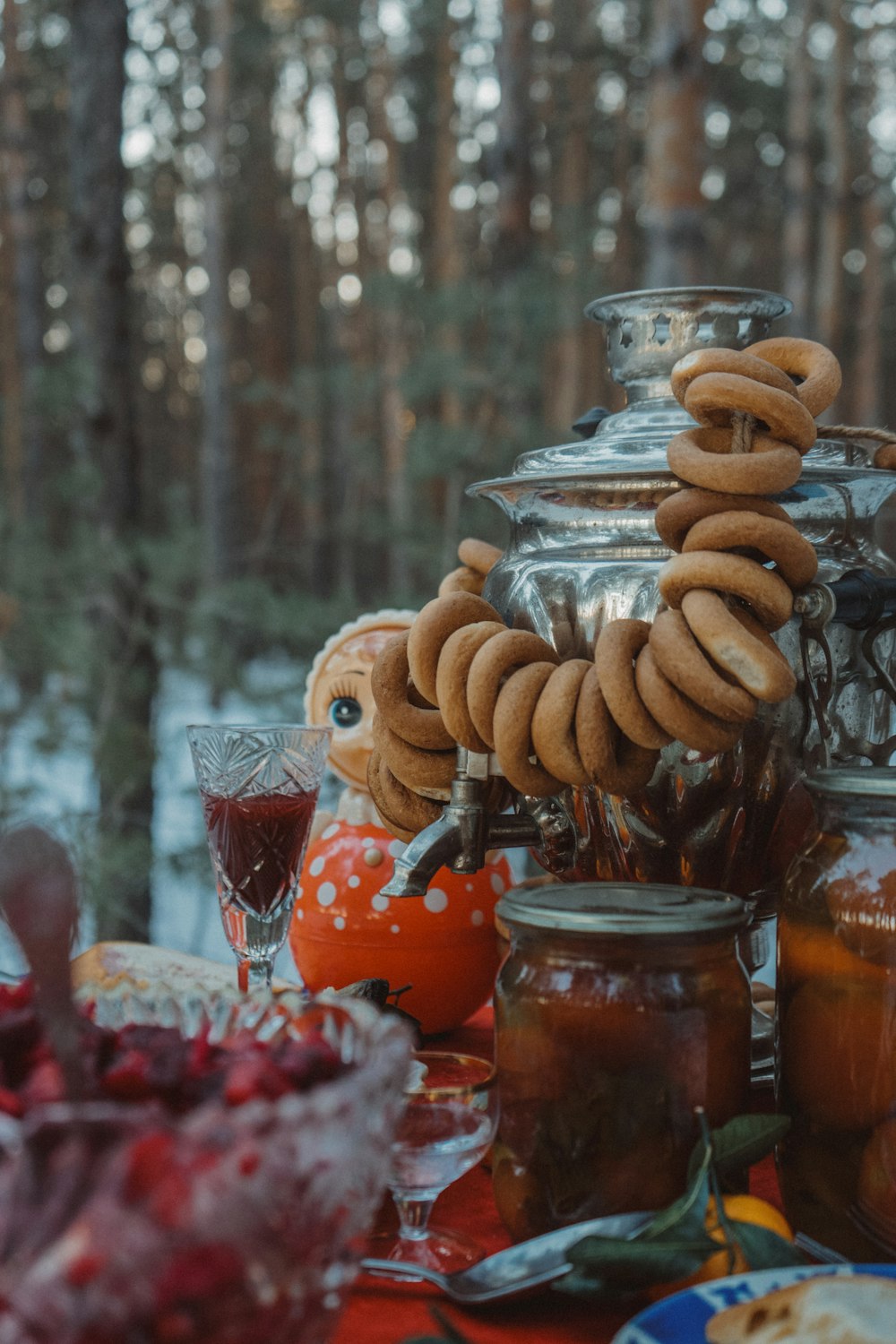 a table topped with jars filled with food