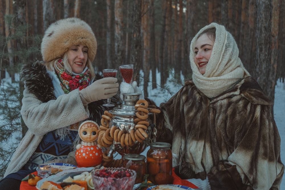 a couple of women standing next to each other