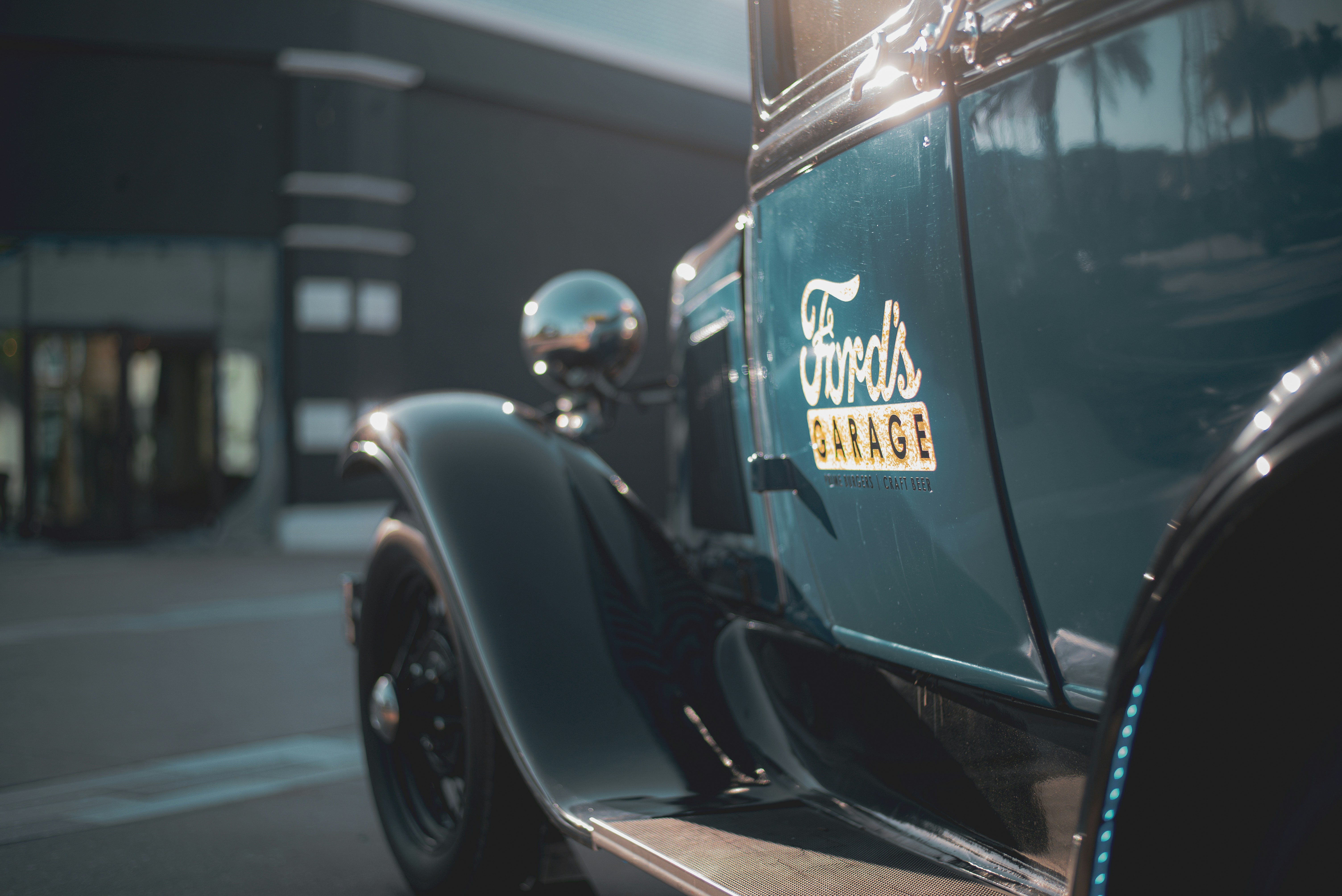 a close up of the front of a classic car