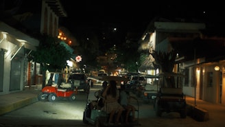 A certified golf cart parked on a quiet neighborhood street at sunset.