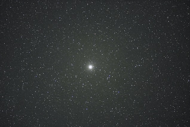 A glowing star shining brightly over a dark horizon symbolizing guidance and new beginnings.