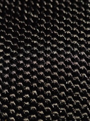 A close-up of high-tech fabric with a sleek design.