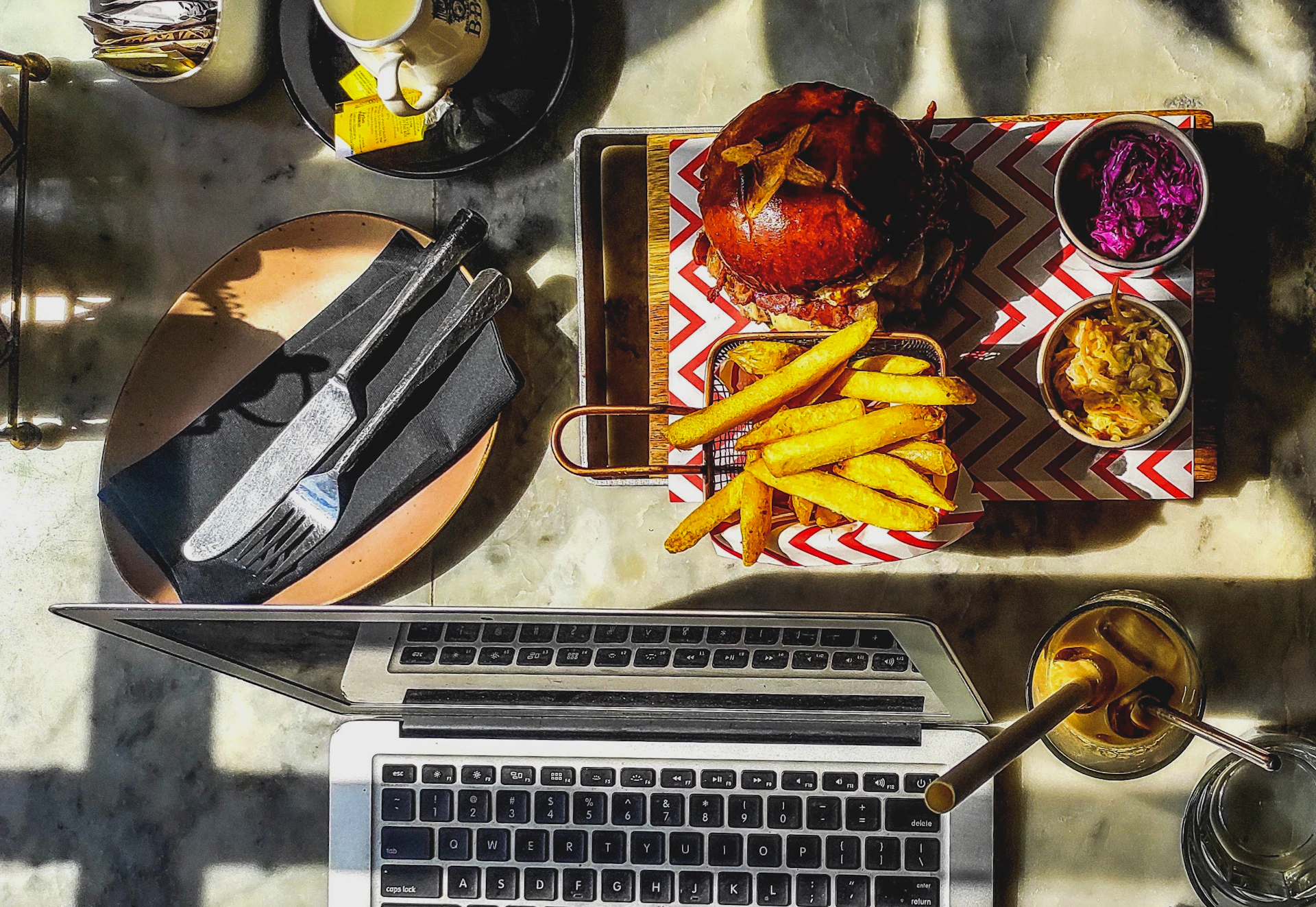 woman wearing yellow long-sleeved dress under white clouds and blue sky during daytime