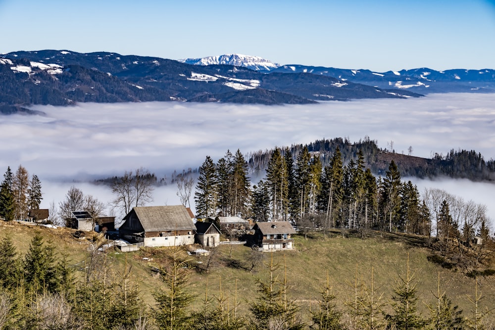 a view of a mountain with a house in the foreground