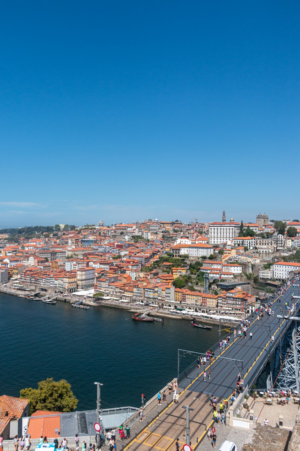 a view of a city and a bridge over a body of water