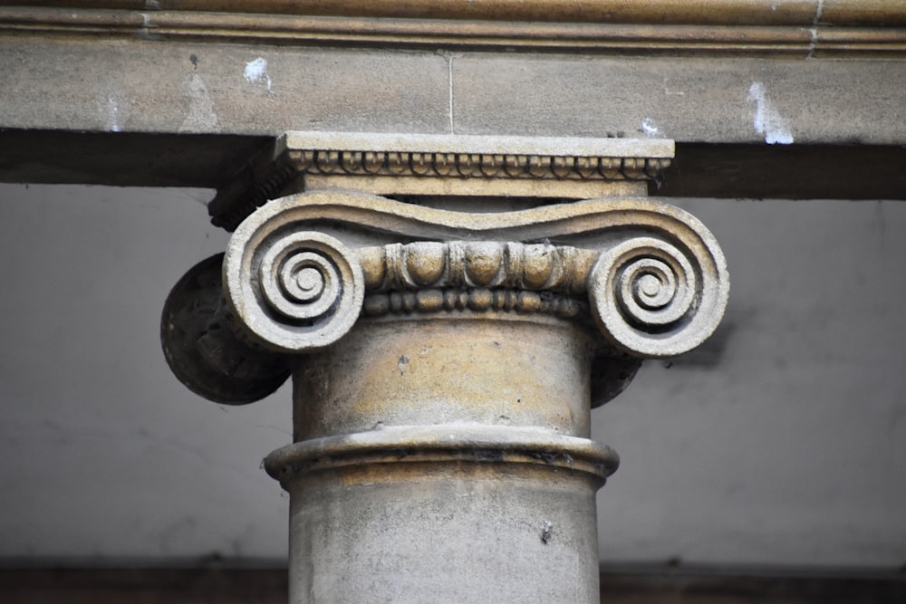 a close up of a column with a decorative design