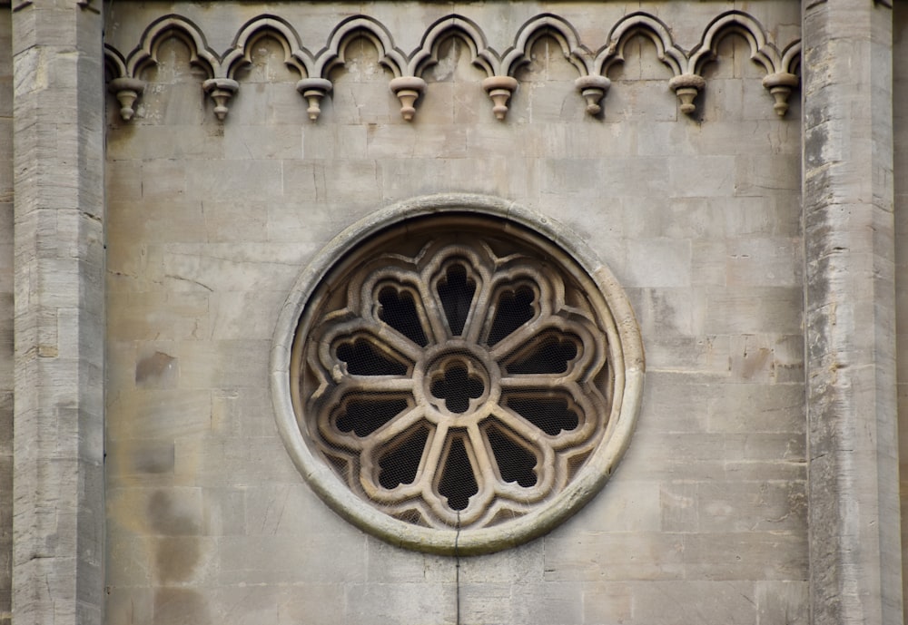 a round window on the side of a building