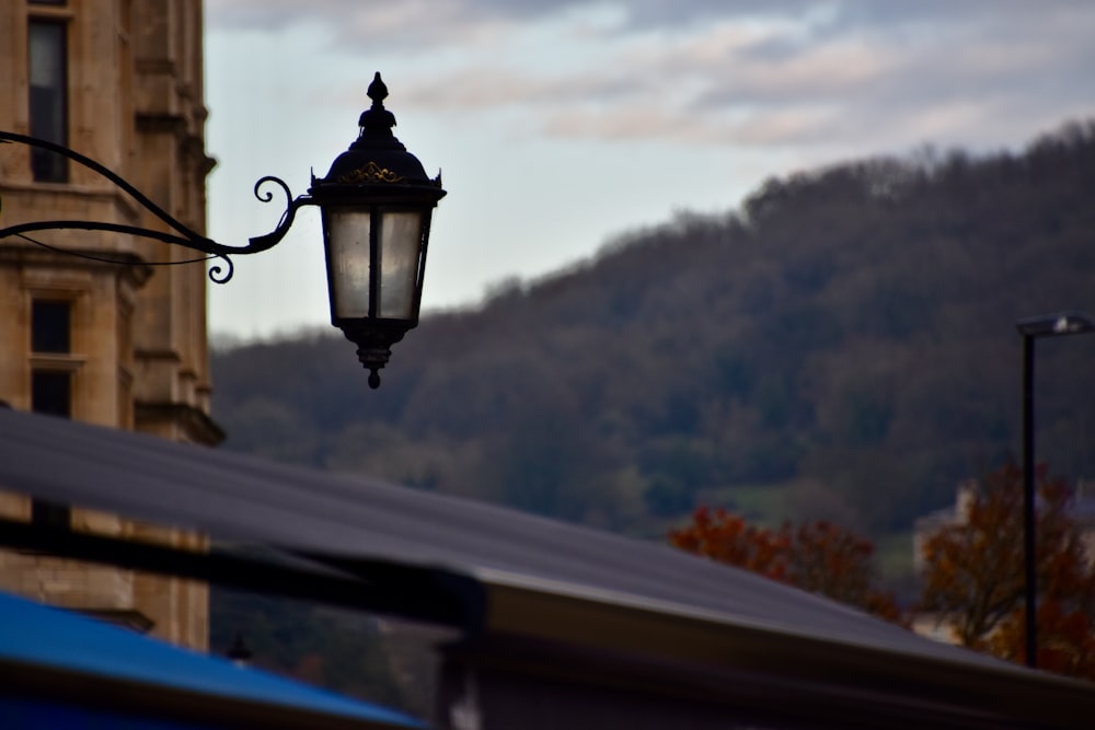 a street light hanging off the side of a building